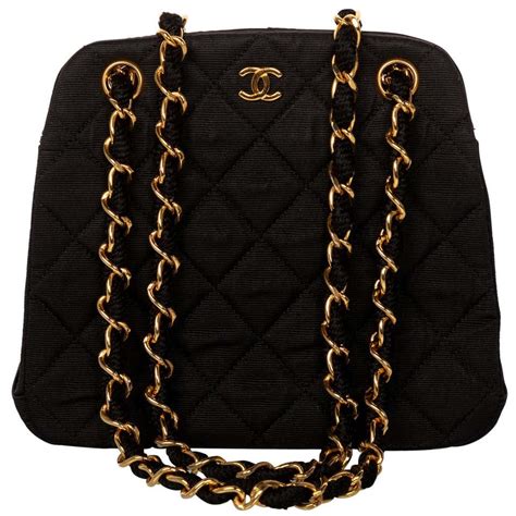 chanel black chain bag|small black quilted Chanel bag.